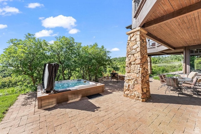 1355 W Red Hawk Trl Unit 35, Park City, UT 84098 - view of patio / terrace with outdoor dining area and an outdoor hot tub