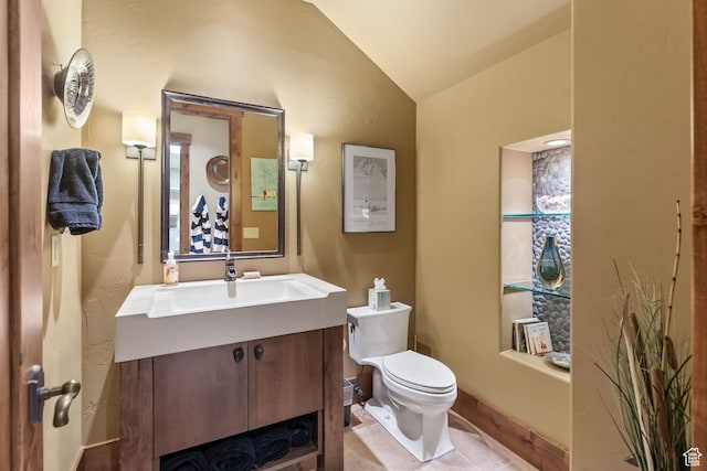 1355 W Red Hawk Trl Unit 35, Park City, UT 84098 - bathroom with lofted ceiling, baseboards, toilet, and vanity