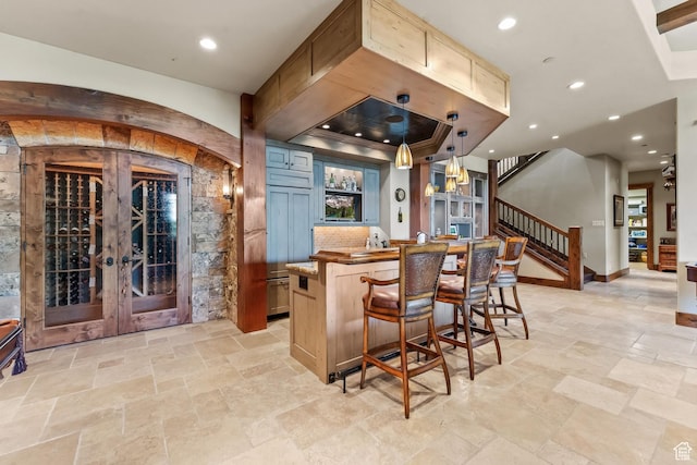1355 W Red Hawk Trl Unit 35, Park City, UT 84098 - bar featuring recessed lighting, bar area, baseboards, stairs, and stone tile flooring