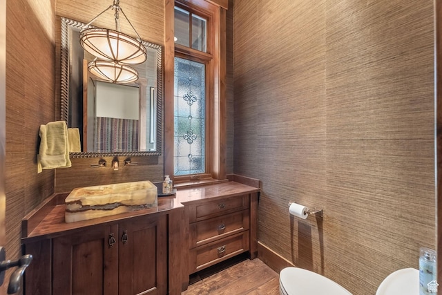 1355 W Red Hawk Trl Unit 35, Park City, UT 84098 - half bathroom featuring wood finished floors, vanity, and toilet