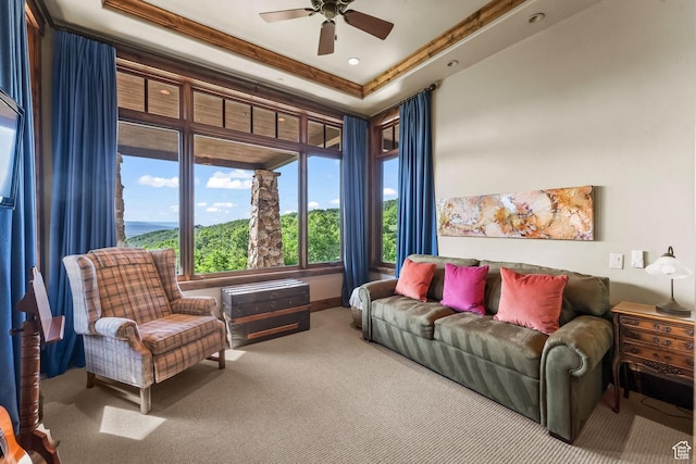 1355 W Red Hawk Trl Unit 35, Park City, UT 84098 - living area with ornamental molding, a tray ceiling, carpet flooring, and a ceiling fan