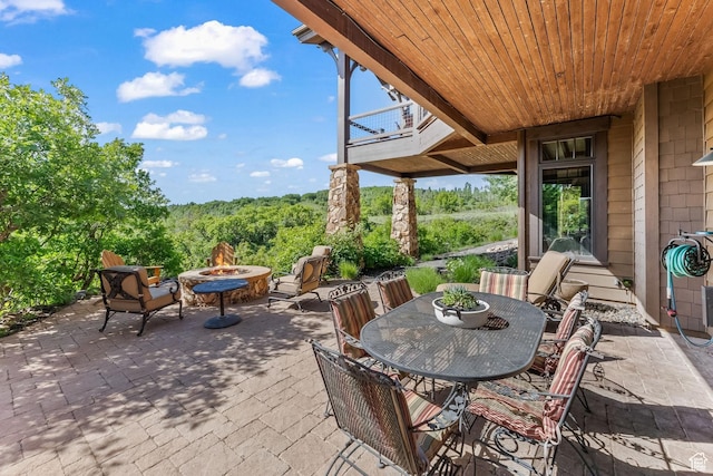 1355 W Red Hawk Trl Unit 35, Park City, UT 84098 - view of patio with an outdoor fire pit and outdoor dining area