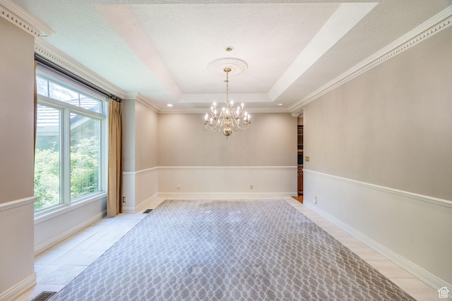 1387 E 260 N, Logan, UT 84321 - spare room featuring plenty of natural light, light tile patterned flooring, a raised ceiling, and an inviting chandelier