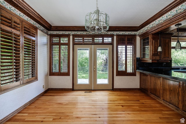 1387 E 260 N, Logan, UT 84321 - doorway to outside with crown molding, french doors, light hardwood / wood-style flooring, and a chandelier