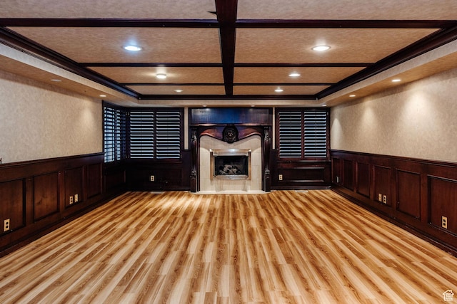 1387 E 260 N, Logan, UT 84321 - unfurnished living room featuring a tile fireplace, light hardwood / wood-style flooring, and coffered ceiling