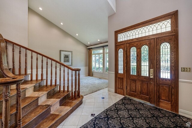 1387 E 260 N, Logan, UT 84321 - foyer with light tile patterned floors, a healthy amount of sunlight, and high vaulted ceiling