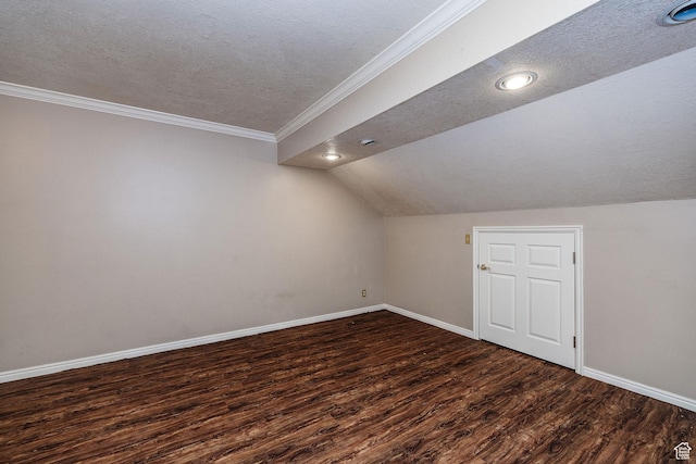 1387 E 260 N, Logan, UT 84321 - additional living space with dark wood-type flooring, a textured ceiling, and vaulted ceiling