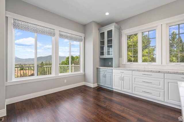 3128 E Hunters Ridge Way, Heber City, UT 84032 - bar with baseboards, a mountain view, dark wood-type flooring, and recessed lighting