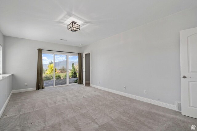 3128 E Hunters Ridge Way, Heber City, UT 84032 - spare room with light carpet and baseboards
