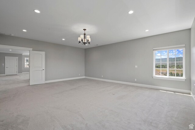 3128 E Hunters Ridge Way, Heber City, UT 84032 - empty room with a chandelier, recessed lighting, light carpet, and baseboards