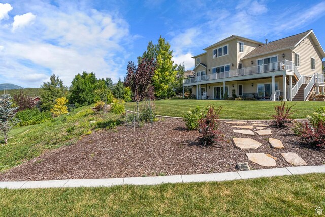 3128 E Hunters Ridge Way, Heber City, UT 84032 - view of grassy yard with a deck and stairway