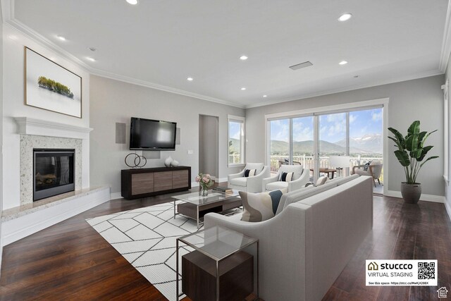 3128 E Hunters Ridge Way, Heber City, UT 84032 - living room featuring crown molding, wood finished floors, recessed lighting, a premium fireplace, and baseboards