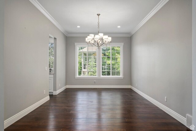 3128 E Hunters Ridge Way, Heber City, UT 84032 - unfurnished dining area with a chandelier, dark wood-type flooring, baseboards, crown molding, and recessed lighting