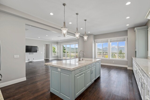 3128 E Hunters Ridge Way, Heber City, UT 84032 - kitchen with a sink, baseboards, recessed lighting, a center island with sink, and dark wood-type flooring