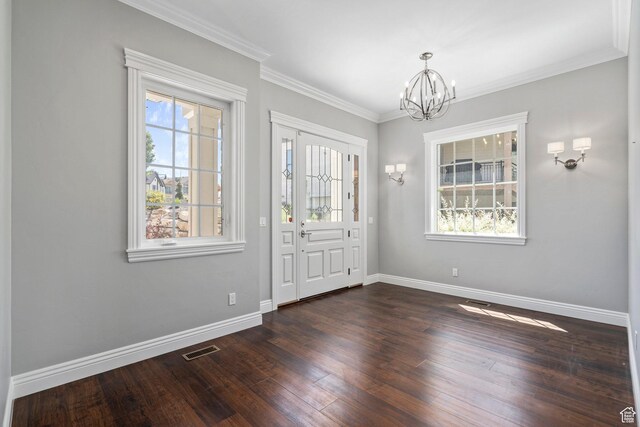 3128 E Hunters Ridge Way, Heber City, UT 84032 - entrance foyer featuring a chandelier, baseboards, dark wood-style floors, and ornamental molding