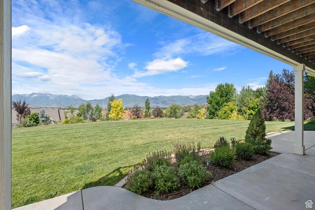 3128 E Hunters Ridge Way, Heber City, UT 84032 - view of green lawn featuring a mountain view and a patio