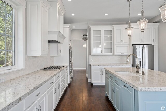 3128 E Hunters Ridge Way, Heber City, UT 84032 - kitchen featuring a sink, stainless steel appliances, white cabinetry, recessed lighting, and healthy amount of natural light