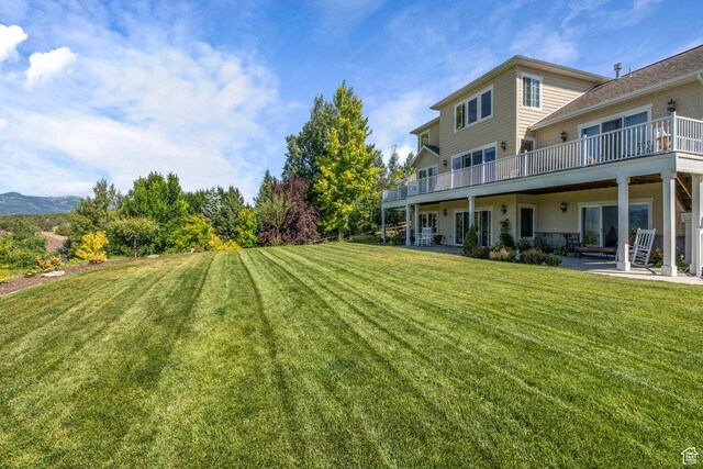 3128 E Hunters Ridge Way, Heber City, UT 84032 - view of green lawn featuring a patio area