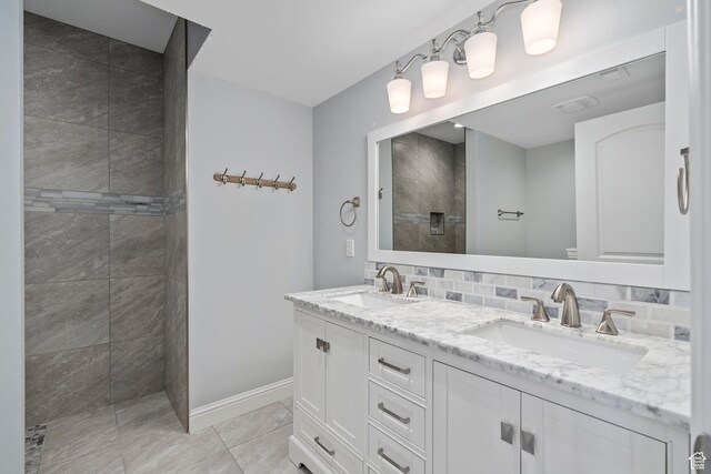 3128 E Hunters Ridge Way, Heber City, UT 84032 - full bathroom featuring walk in shower, double vanity, and baseboards