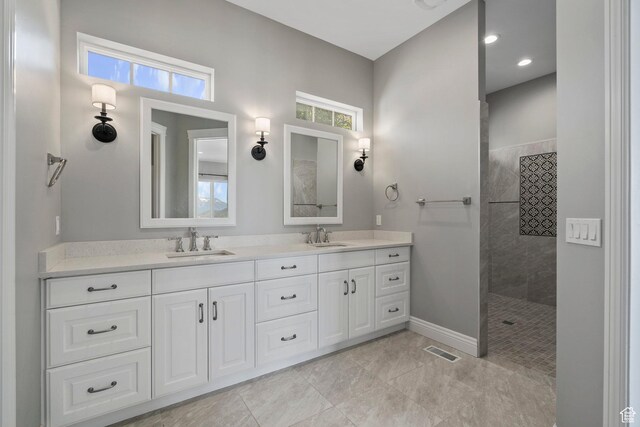 3128 E Hunters Ridge Way, Heber City, UT 84032 - bathroom with double vanity, walk in shower, baseboards, recessed lighting, and tile patterned floors
