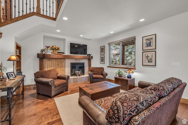 1126 Station Loop Rd, Park City, UT 84098 - living room featuring a tiled fireplace and wood-type flooring