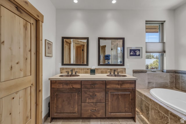 1126 Station Loop Rd, Park City, UT 84098 - bathroom featuring tile flooring, double sink vanity, and tiled tub