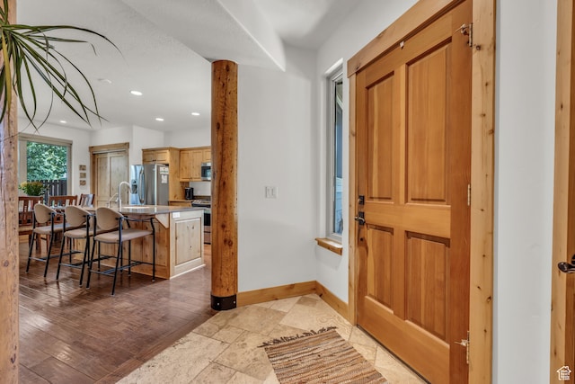 1126 Station Loop Rd, Park City, UT 84098 - foyer entrance featuring sink and light hardwood / wood-style floors