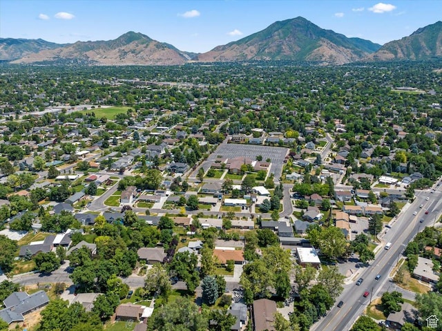 birds eye view of property featuring a mountain view