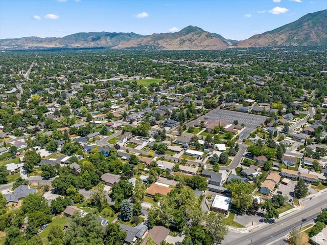 birds eye view of property with a mountain view