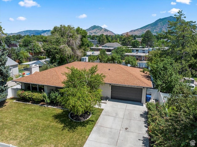 drone / aerial view featuring a mountain view