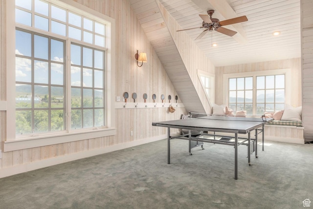 1380 S Mills Ln, Heber City, UT 84032 - game room with carpet floors, wood walls, ceiling fan, baseboards, and lofted ceiling