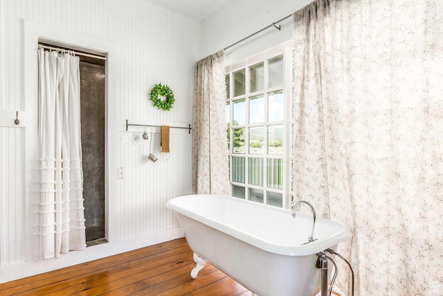 1380 S Mills Ln, Heber City, UT 84032 - full bath featuring hardwood / wood-style floors, wallpapered walls, and a freestanding bath