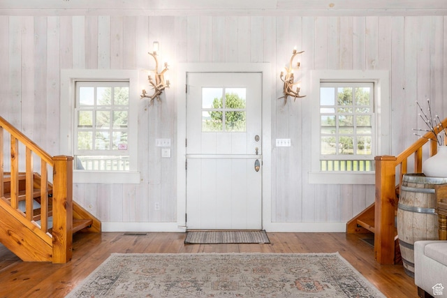 1380 S Mills Ln, Heber City, UT 84032 - entrance foyer with stairway, hardwood / wood-style floors, and wood walls
