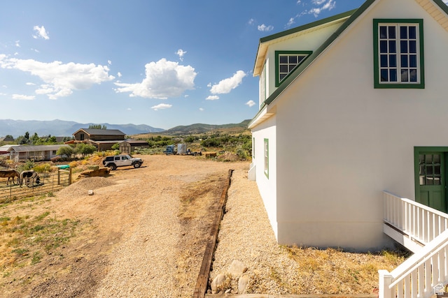exterior space featuring a mountain view