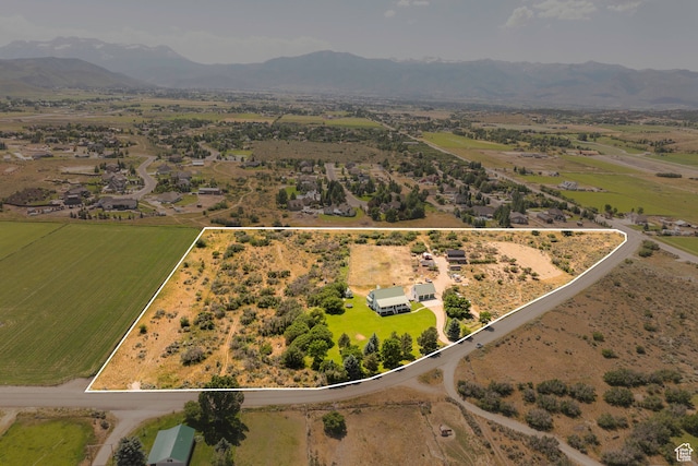 bird's eye view with a mountain view and a rural view