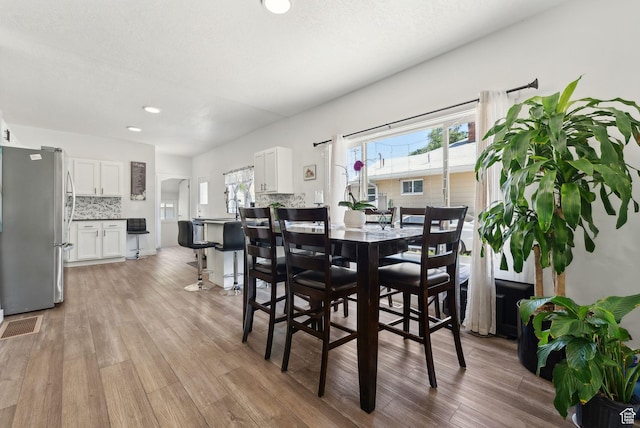 2977 S 8950 W, Magna, UT 84044 - dining space with light hardwood / wood-style flooring