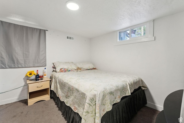 2977 S 8950 W, Magna, UT 84044 - bedroom featuring a textured ceiling and dark carpet