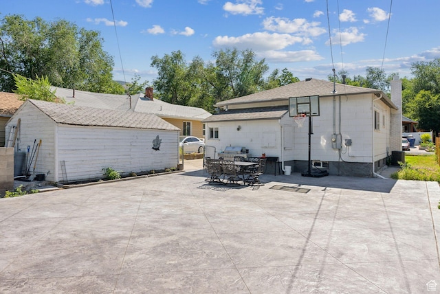 2977 S 8950 W, Magna, UT 84044 - rear view of house featuring a patio