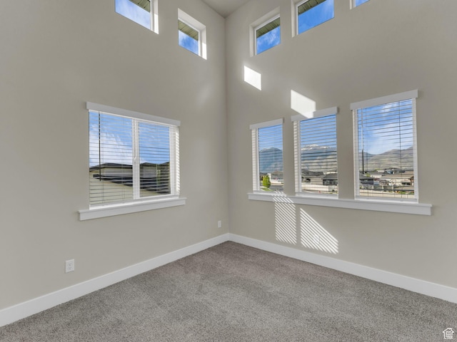 2562 E 80 S, Spanish Fork, UT 84660 - carpeted empty room with baseboards and a high ceiling