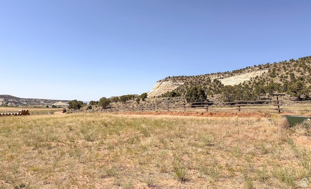 mountain view featuring a rural view