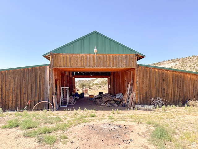 view of outbuilding with a mountain view