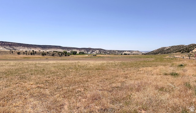 property view of mountains featuring a rural view