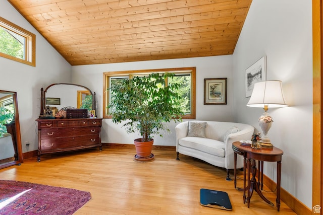 9443 E Wild Clematis Ln Unit 1, Brighton, UT 84121 - living area featuring a healthy amount of sunlight, light wood-style floors, wood ceiling, and vaulted ceiling