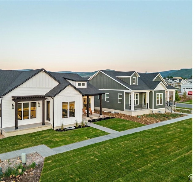 1901 S Sawmill Blvd E Unit 415, Heber City, UT 84032 - back house at dusk with a yard
