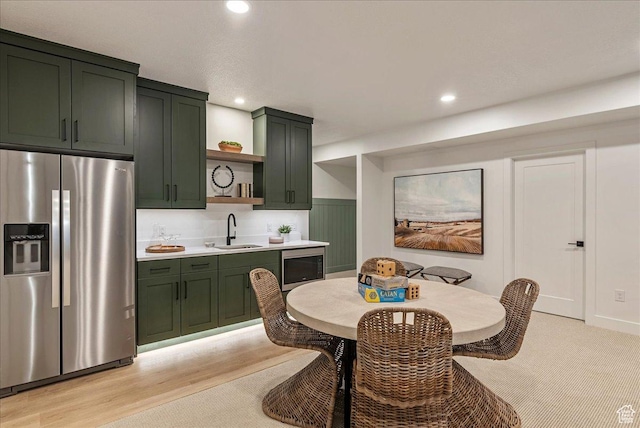 1901 S Sawmill Blvd E Unit 415, Heber City, UT 84032 - dining room with light wood-type flooring, wine cooler, and sink