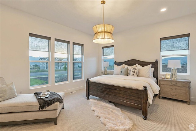 1901 S Sawmill Blvd E Unit 415, Heber City, UT 84032 - bedroom with multiple windows and light colored carpet