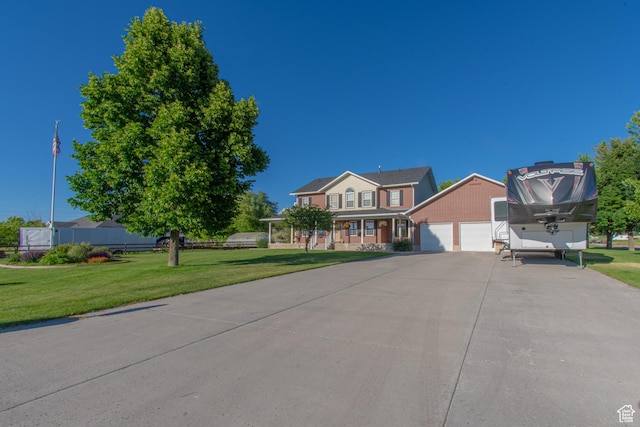 560 N 400 W, Smithfield, UT 84335 - traditional home featuring driveway and a front lawn