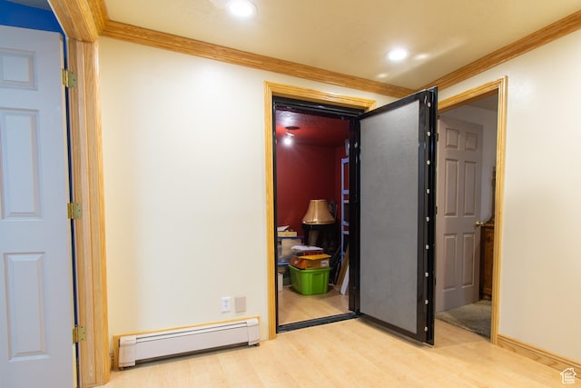 560 N 400 W, Smithfield, UT 84335 - hallway featuring a baseboard heating unit, wood finished floors, ornamental molding, and recessed lighting