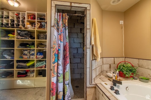 560 N 400 W, Smithfield, UT 84335 - full bathroom featuring a spacious closet, a garden tub, and tiled shower