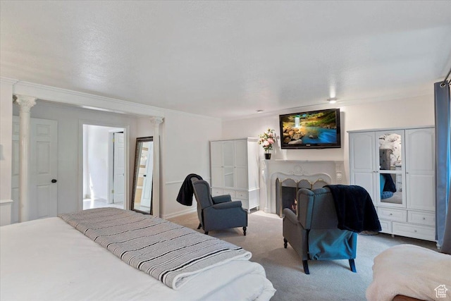 carpeted bedroom with crown molding